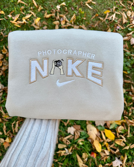 PHOTOGRAPHER (photographe)